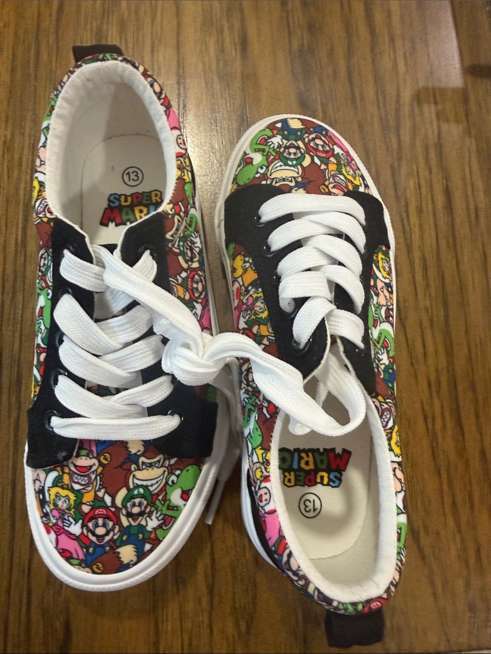 Nintendo Super Mario Kids' Sneakers in White, Black, Green, Red, Pink